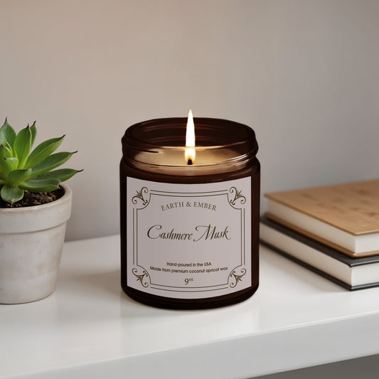 Cashmere Musk scented candle 9oz in elegant amber jar with soft musk fragrance and clean, long-lasting burn.