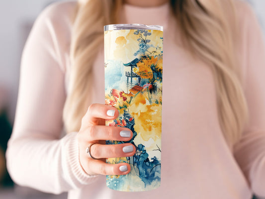 Stainless steel tumbler showcasing traditional ink-style landscape with pagodas and flowering trees.