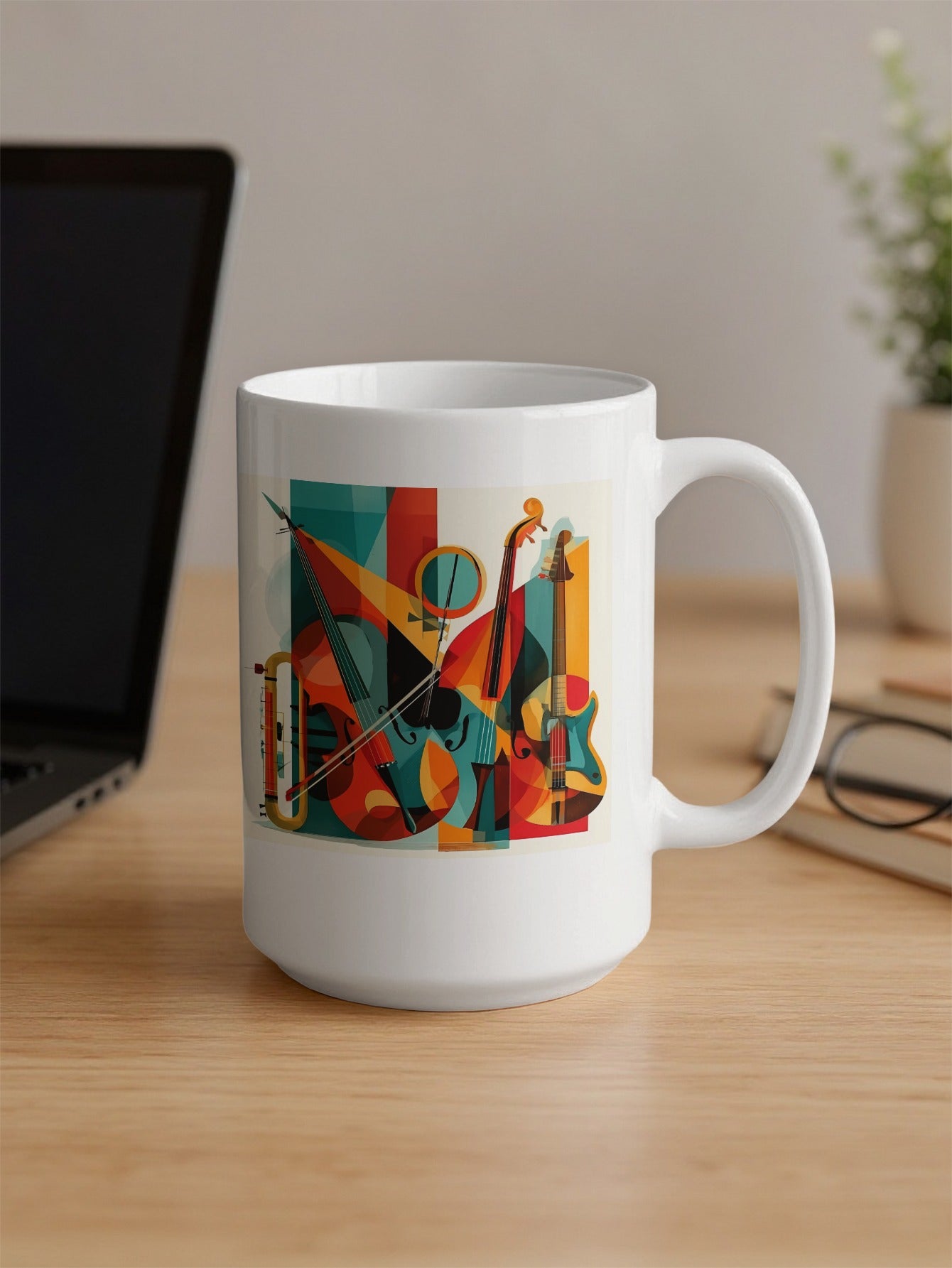 15oz coffee mug showing contemporary music design with layered instruments, angular forms and rich colour contrasts with C-handle.