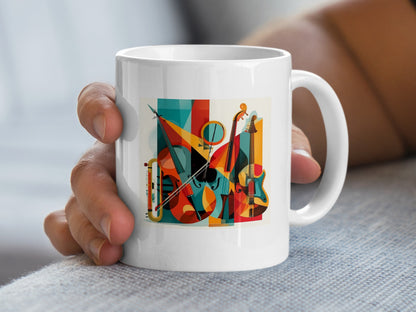 Handheld view showing contemporary music mug artwork with layered string instruments, percussion details and angular shapes.