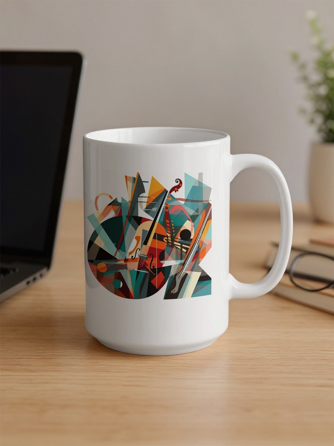 15oz coffee mug showing contemporary music design with violin illustration, geometric shapes and crisp white accents placed on office desk.