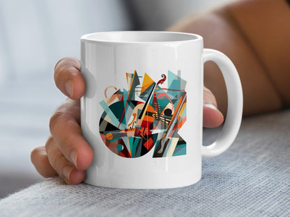 Handheld view showing contemporary music mug artwork with cubist-inspired violin design, bow details and angular shapes.