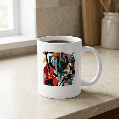 White ceramic mug with cello illustration featuring burnt orange tones, detailed strings and contemporary abstract design elements by window.