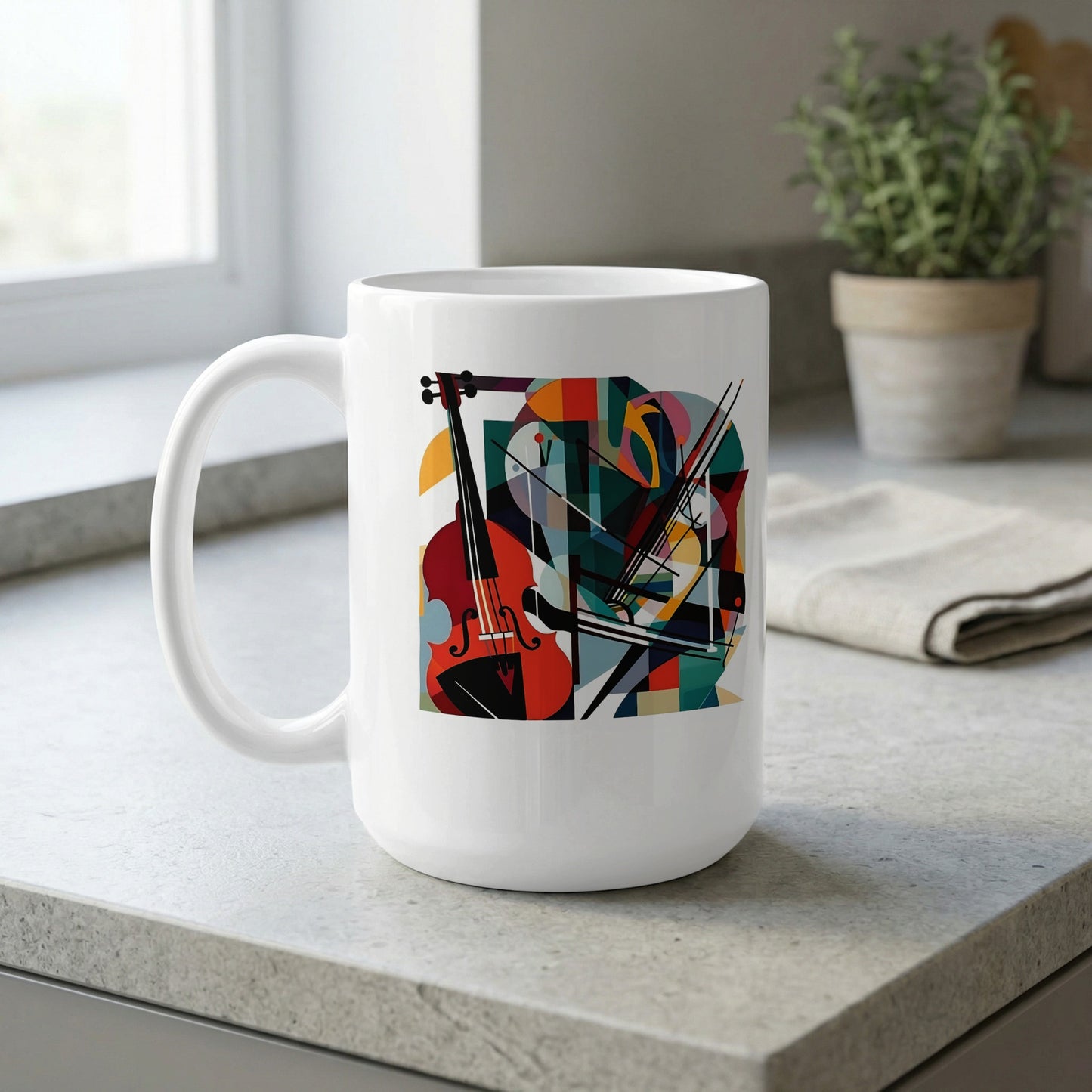 15oz white coffee mug with C-handle displaying cello artwork with burnt orange, red, teal and purple geometric composition by window.