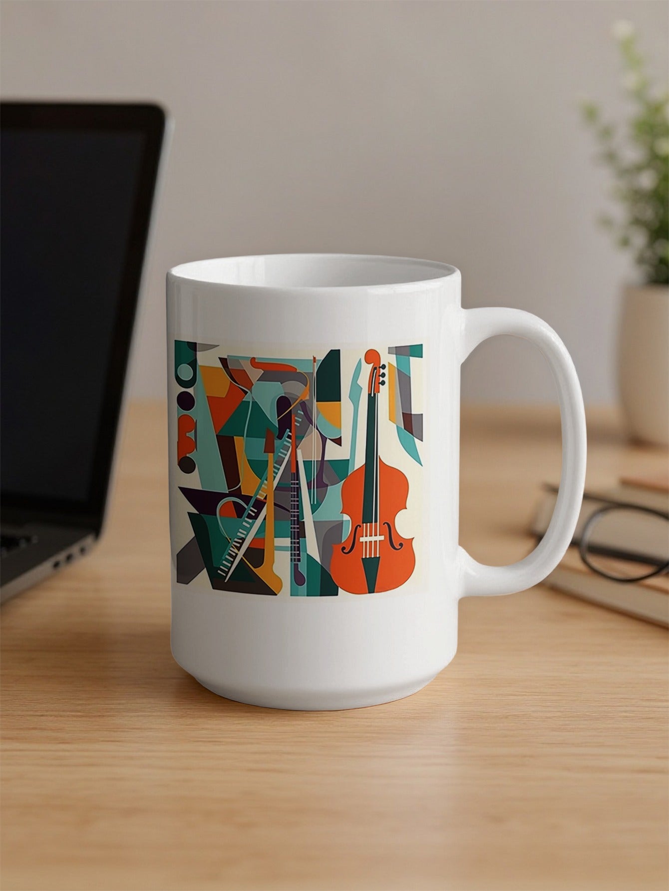 15oz coffee mug showing contemporary music design with cello illustration, layered instruments and colourful geometric forms.