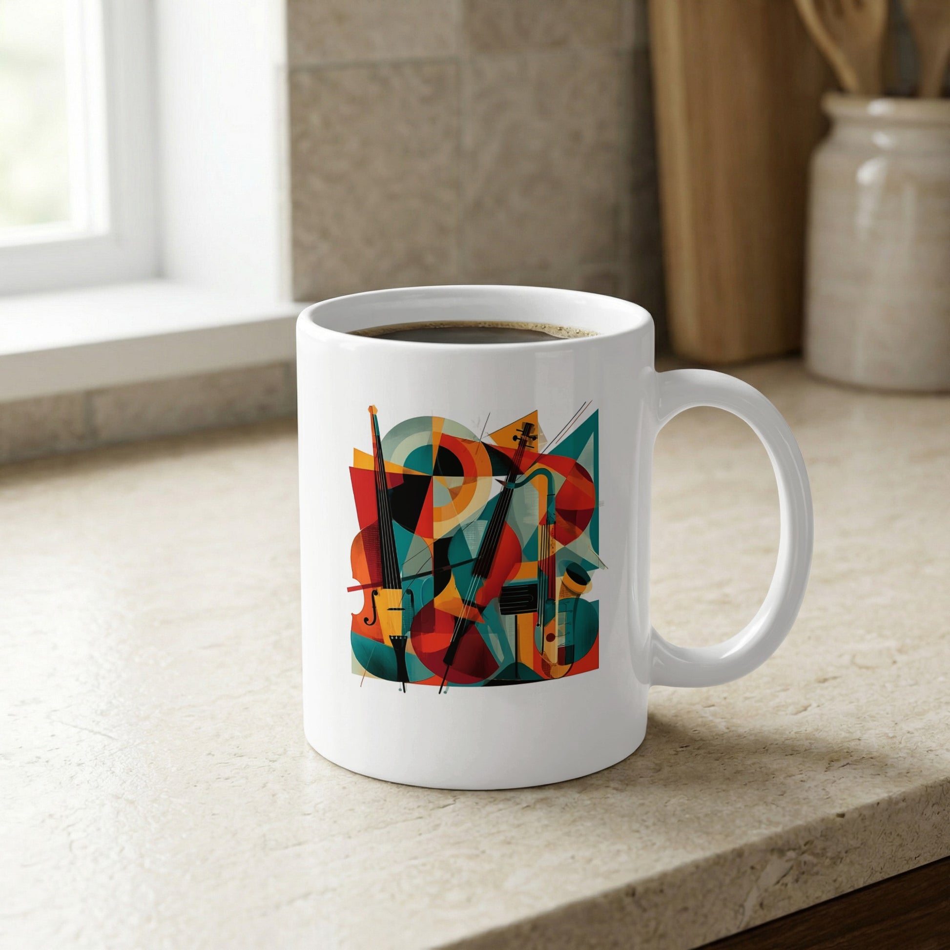 Ceramic mug featuring two cello illustrations with defined f-holes, curved forms and contemporary geometric composition by window.