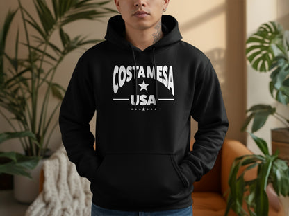 Costa Mesa hoodie, black unisex pullover with relaxed fit, cozy feel, pouch pocket, and versatile everyday casual wear.