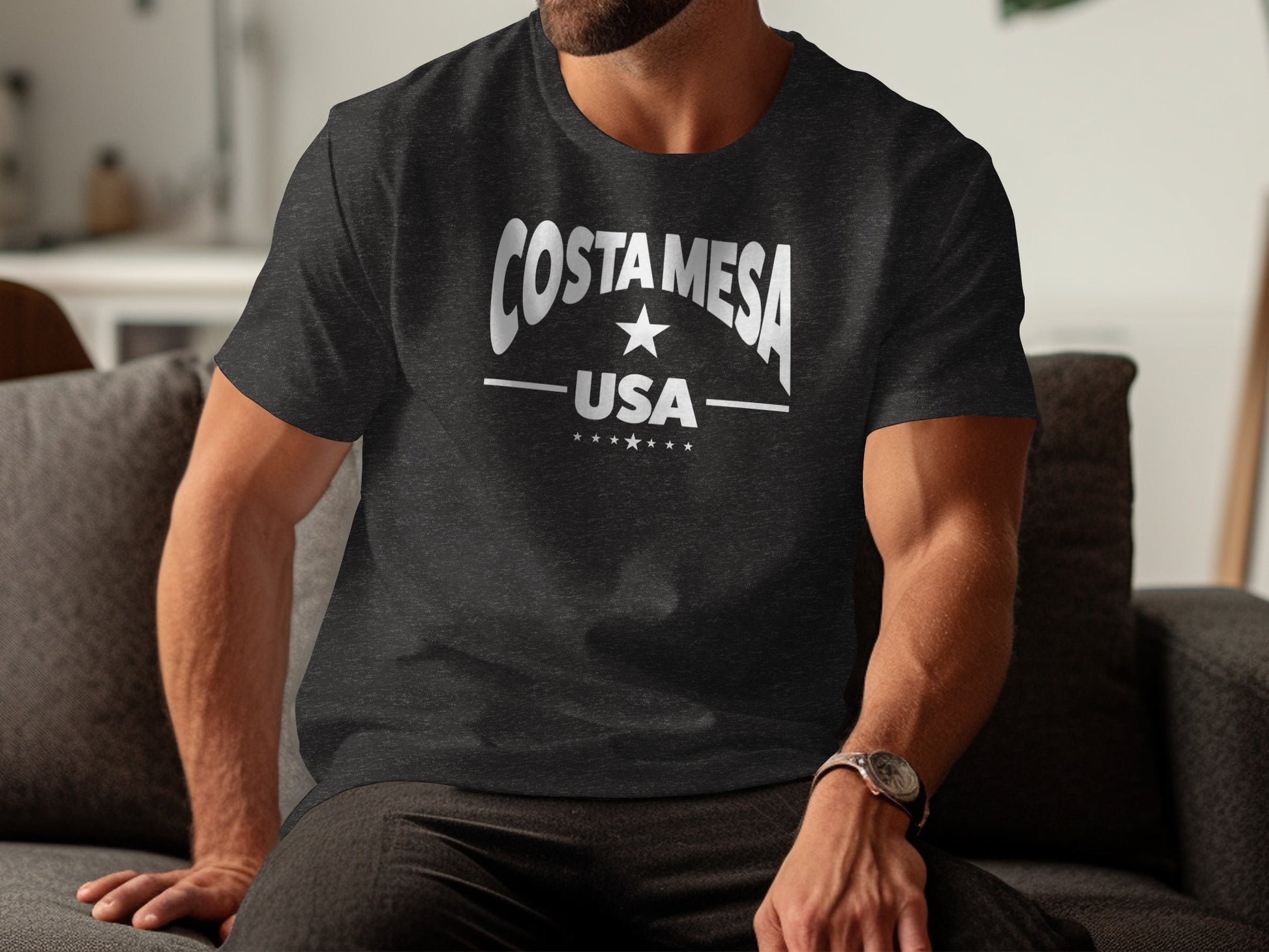 Dark heather grey Costa Mesa t-shirt with collegiate varsity chest design featuring arched Costa Mesa text, central star, and layered USA emblem.
