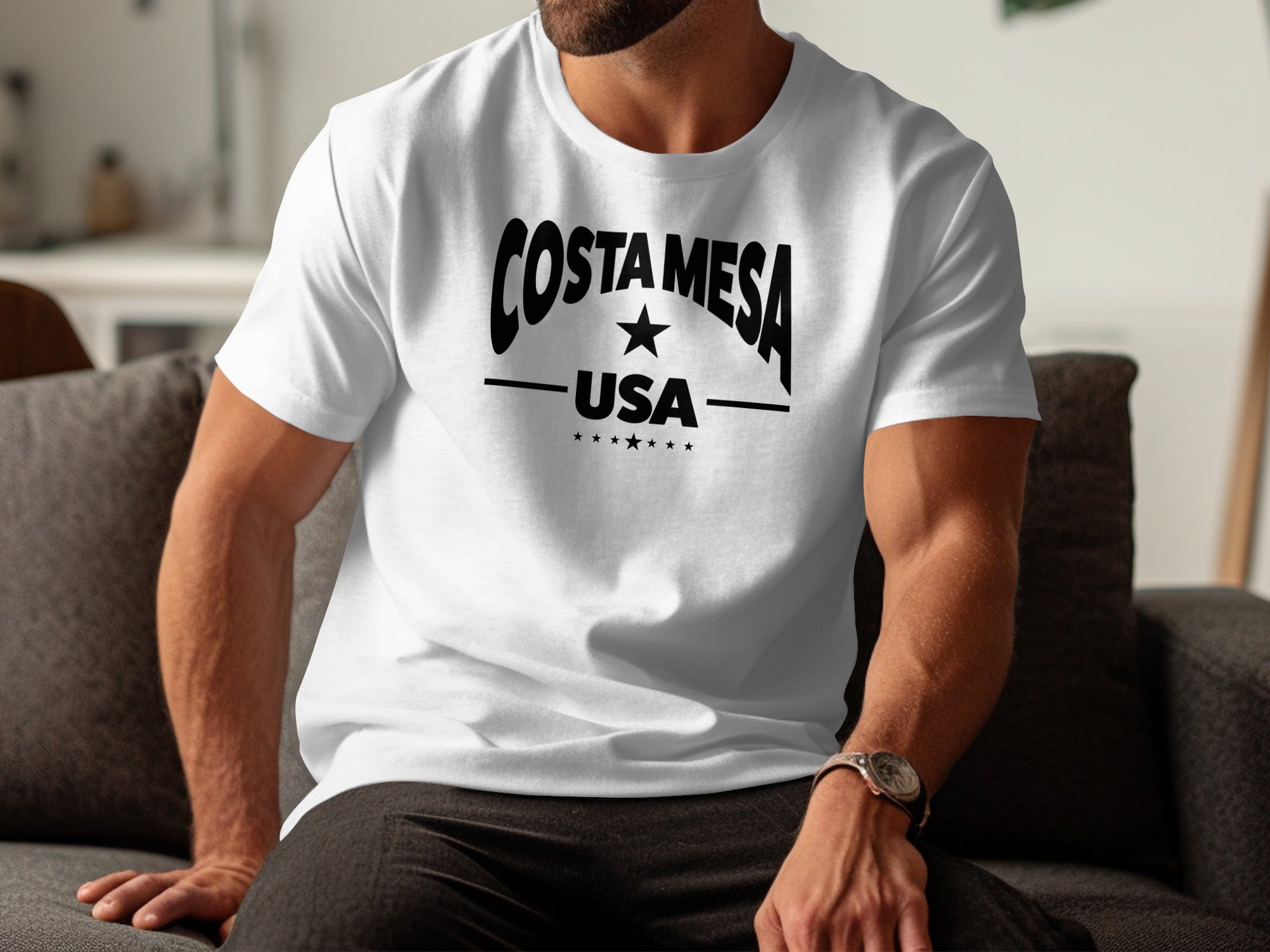 White Costa Mesa t-shirt featuring clean varsity-style chest graphic with high-contrast arched lettering and seven emblem stars.