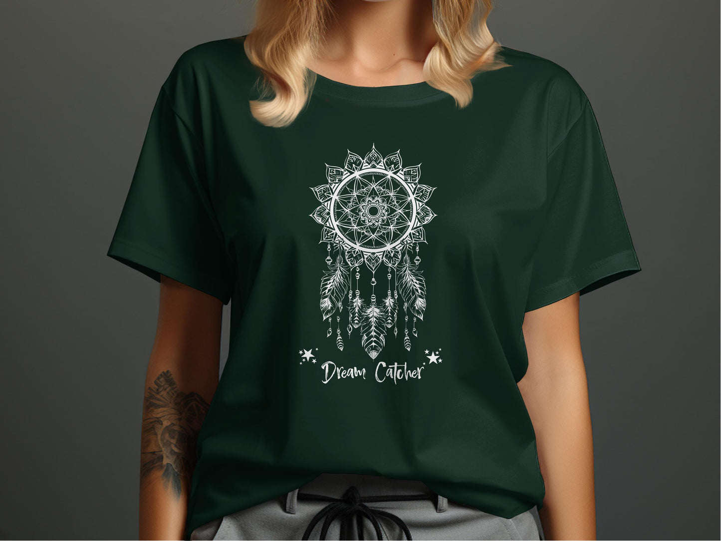 Forest Green Dream Catcher T-Shirt featuring ornate petal-style framing and finely drawn quill texturing.