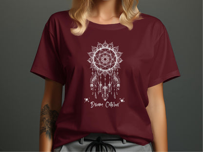 Maroon Dream Catcher T-Shirt with centred celestial-themed line art highlighting five detailed hanging feathers.