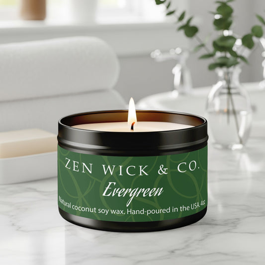 Evergreen scented tin candle 4oz burning on table with soft glow creating a fresh forest-inspired ambiance.