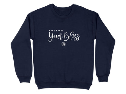 Navy blue Follow Your Bliss sweatshirt with minimal chest print showing layered quote white text and small sun spiral icon.