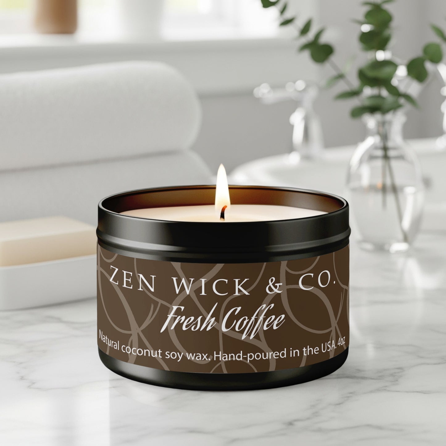 Fresh coffee scented tin candle 4oz burning on table with warm glow creating a cozy café-inspired ambiance.