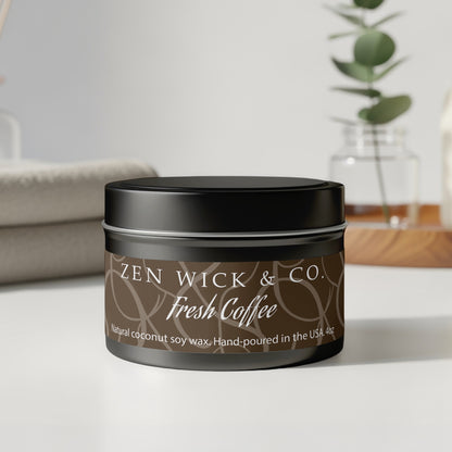 Fresh coffee tin candle 4oz with lid on displayed on table highlighting sleek design and compact, stylish size.