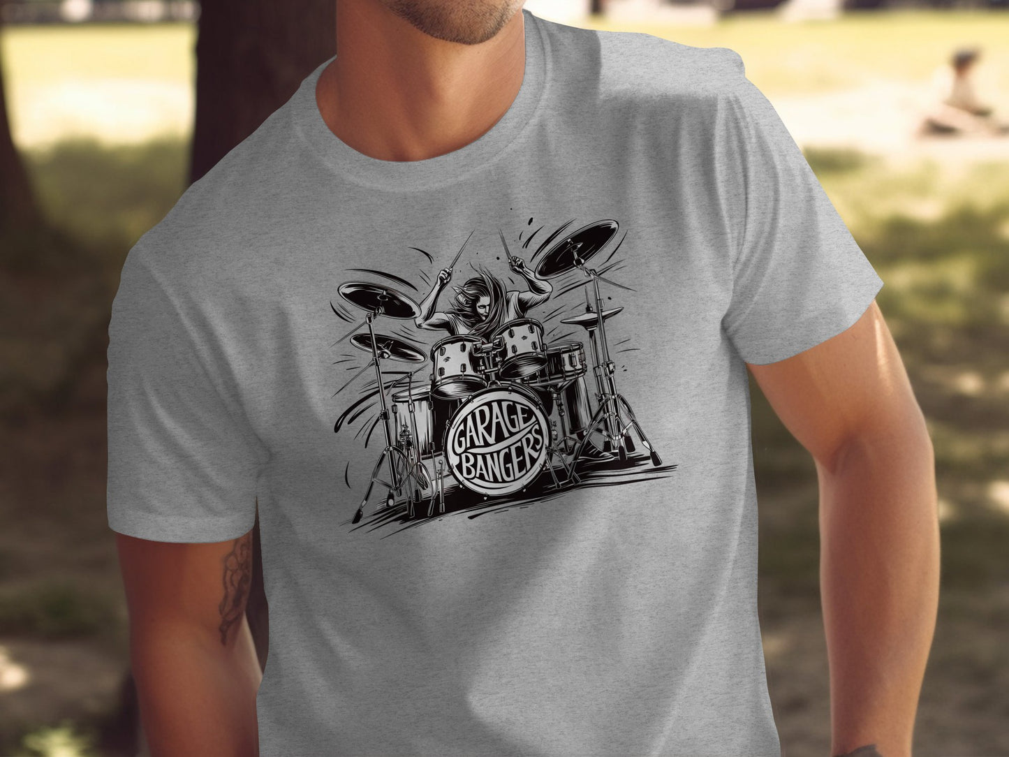 Athletic heather Garage Bangers t-shirt with illustrated drummer mid performance and underground garage rock gig poster style graphic.