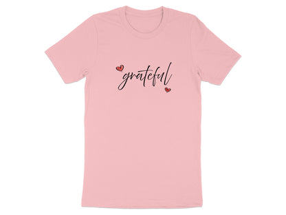 Pink Grateful Heart graphic T-Shirt with white black cursive 'grateful' lettering accented by two small hand-drawn red hearts.