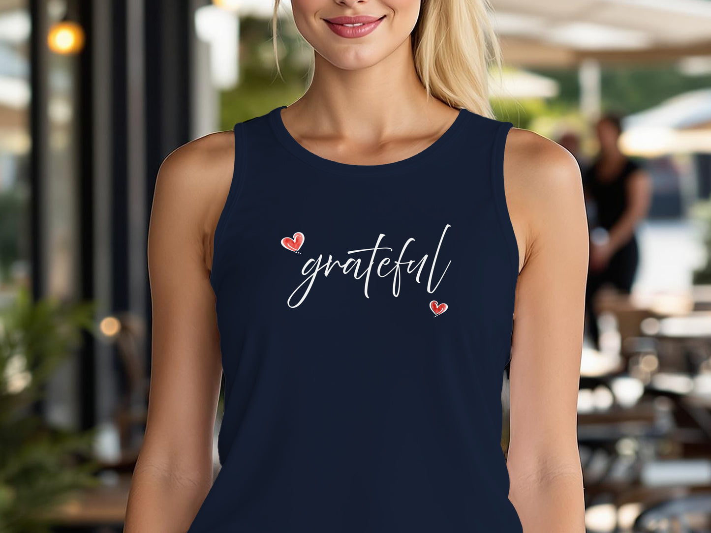 Navy Grateful Heart tank top featuring centre-chest handwritten cursive 'grafteful' white lettering and subtle red heart details.