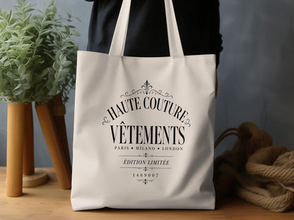 Haute Couture Vêtements canvas tote bag featuring ornate black fashion-house typography on natural canvas.