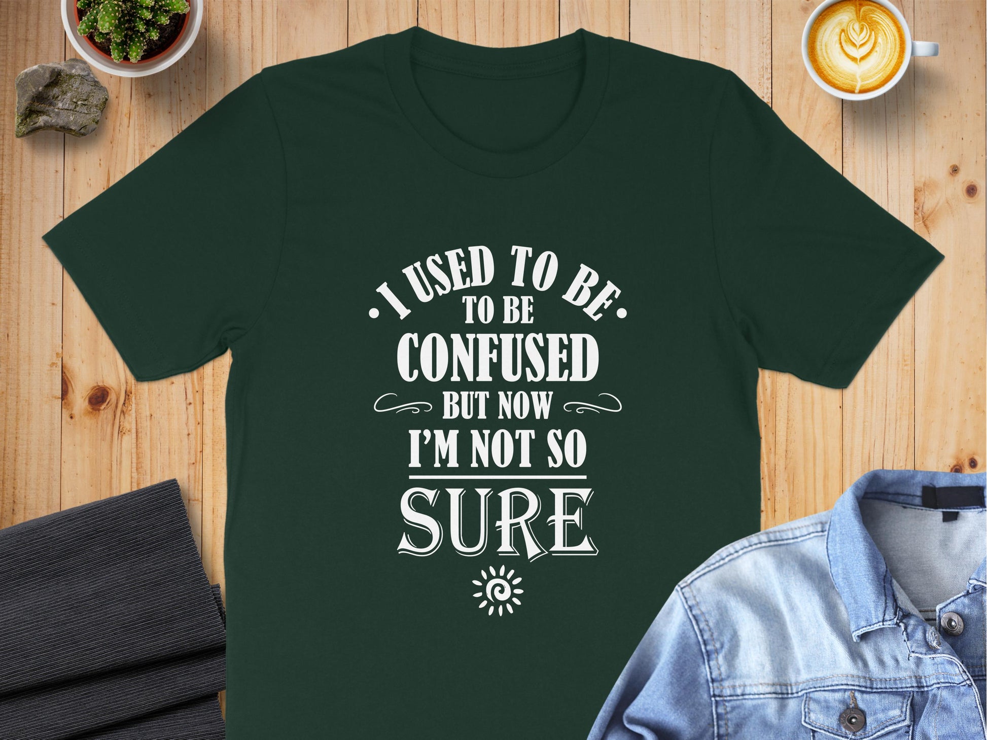 Forest Green I Used To Be Confused T-Shirt with Victorian-inspired lettering, bold typographic hierarchy, and playful quote design.