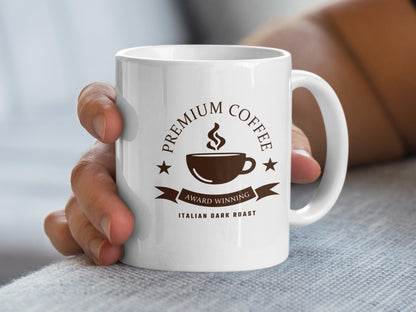 Handheld 11oz Italian Dark Roast Mug showing the Premium Coffee badge, steaming cup and Award Winning banner.
