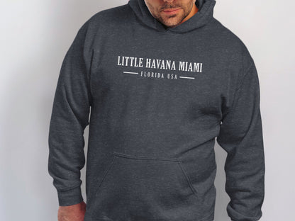Dark heather grey Little Havana Miami Hoodie with white distressed serif typography and vintage Miami destination centre-chest.