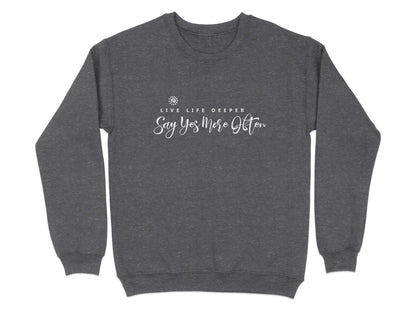 Dark Heather Live Life Deeper sweatshirt showing full chest quote graphic with flowing white script text and spiral sun graphic.