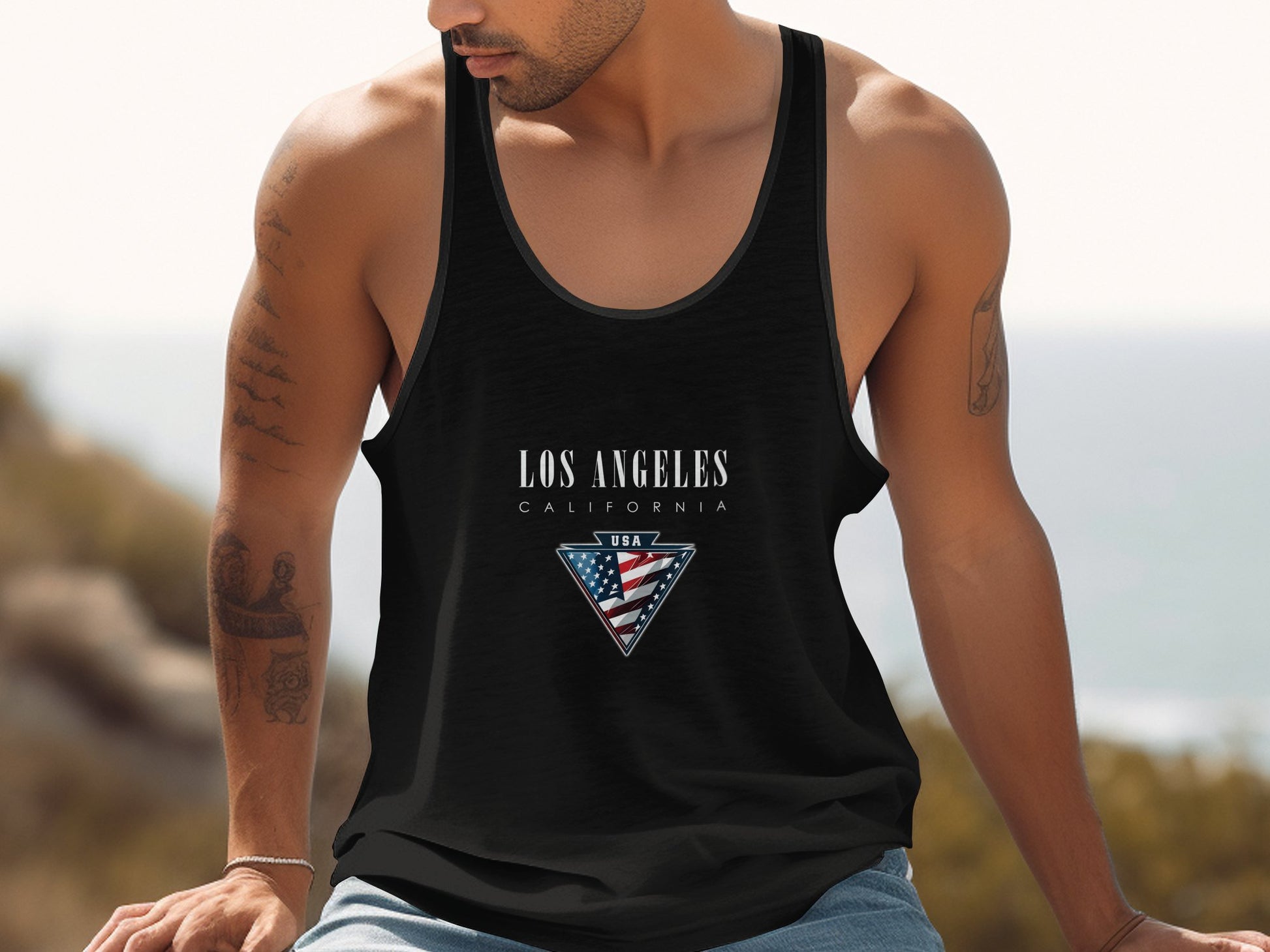 Los Angeles Tank Top for men, sleeveless with scoop neck, cotton fabric, and unisex fit for stylish, everyday wear.