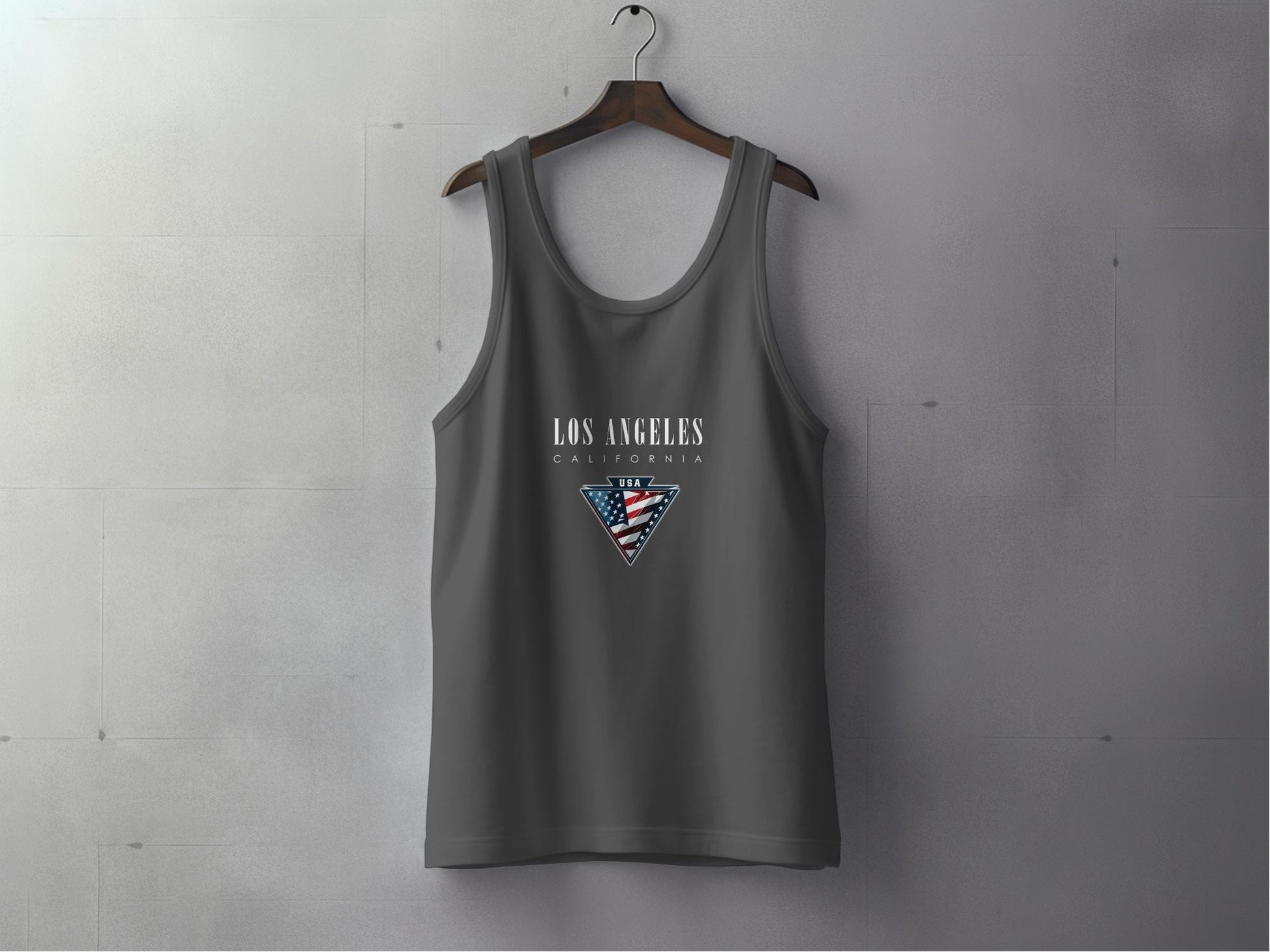 Charcoal Los Angeles Tank Top showing clean LA text layout with stylised red, white, and blue flag triangle motif.
