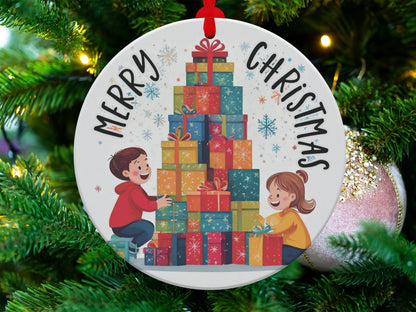 Christmas tree ornament featuring children surrounded by colourful presents and playful seasonal artwork.