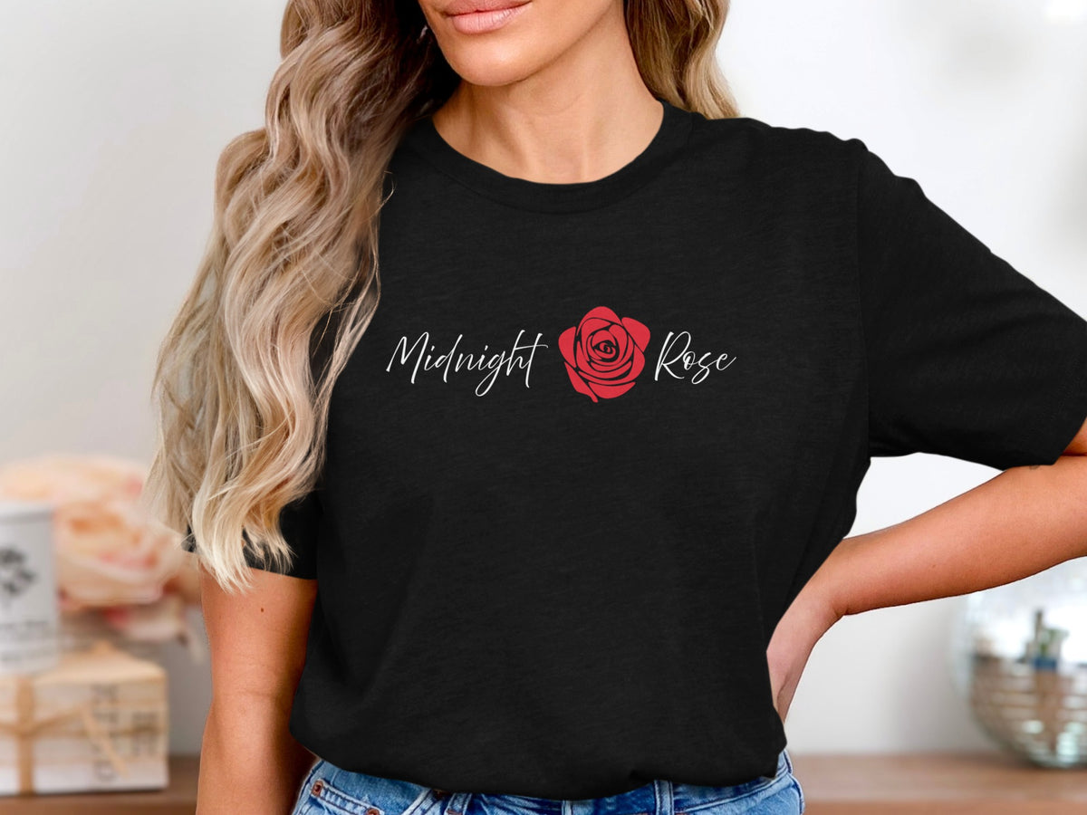 Black Midnight Rose T-Shirt featuring white flowing handwritten script and a single red rose in bloom.