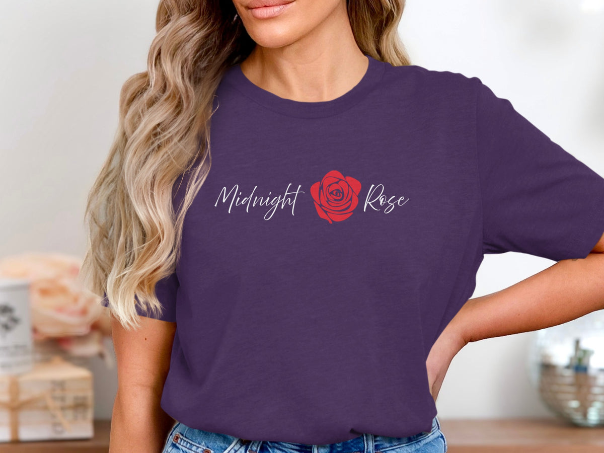 Purple Midnight Rose graphic T-Shirt with minimalist white script lettering and a red rose illustration between the two words.