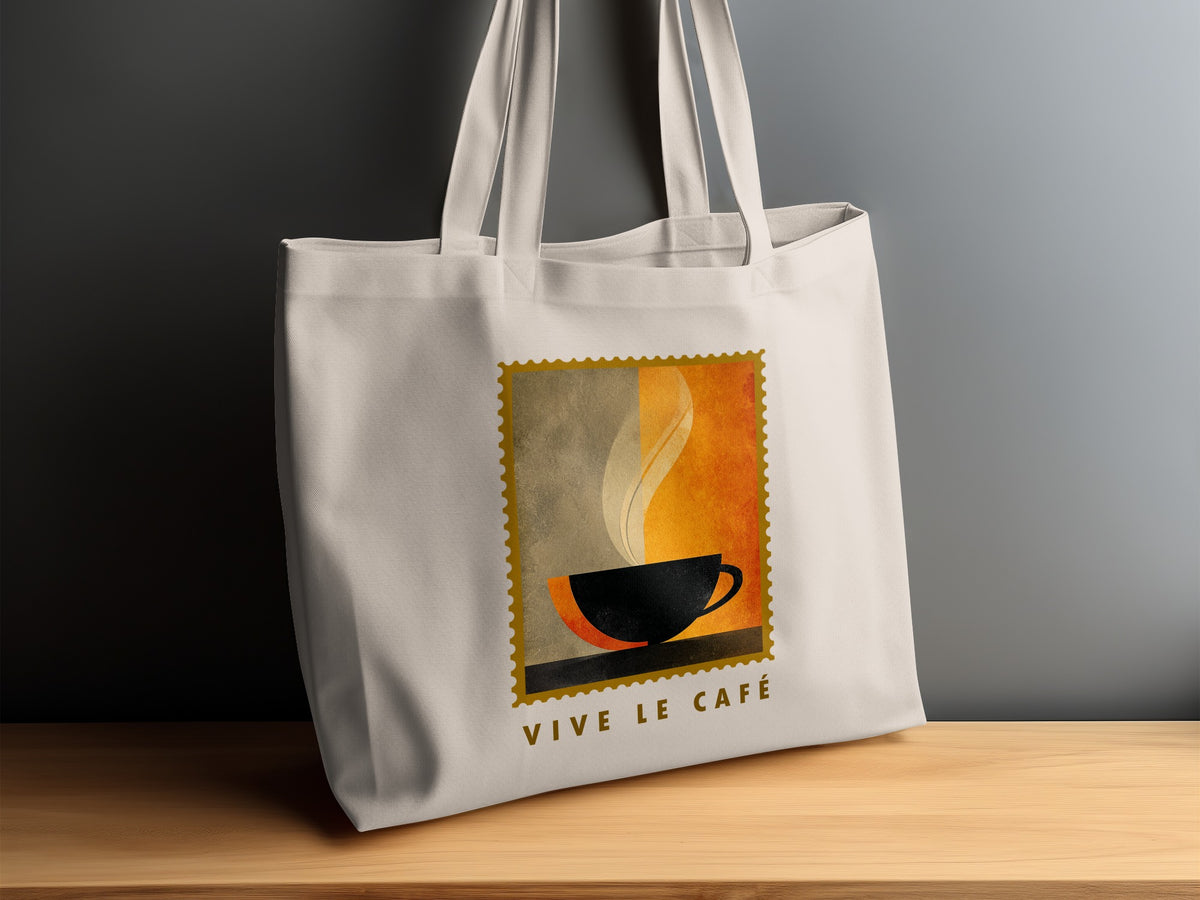 Minimalist Coffee & Steam canvas tote bag on timber sideboard with black cup, two-tone colour fields and VIVE LE CAFE subtitle.