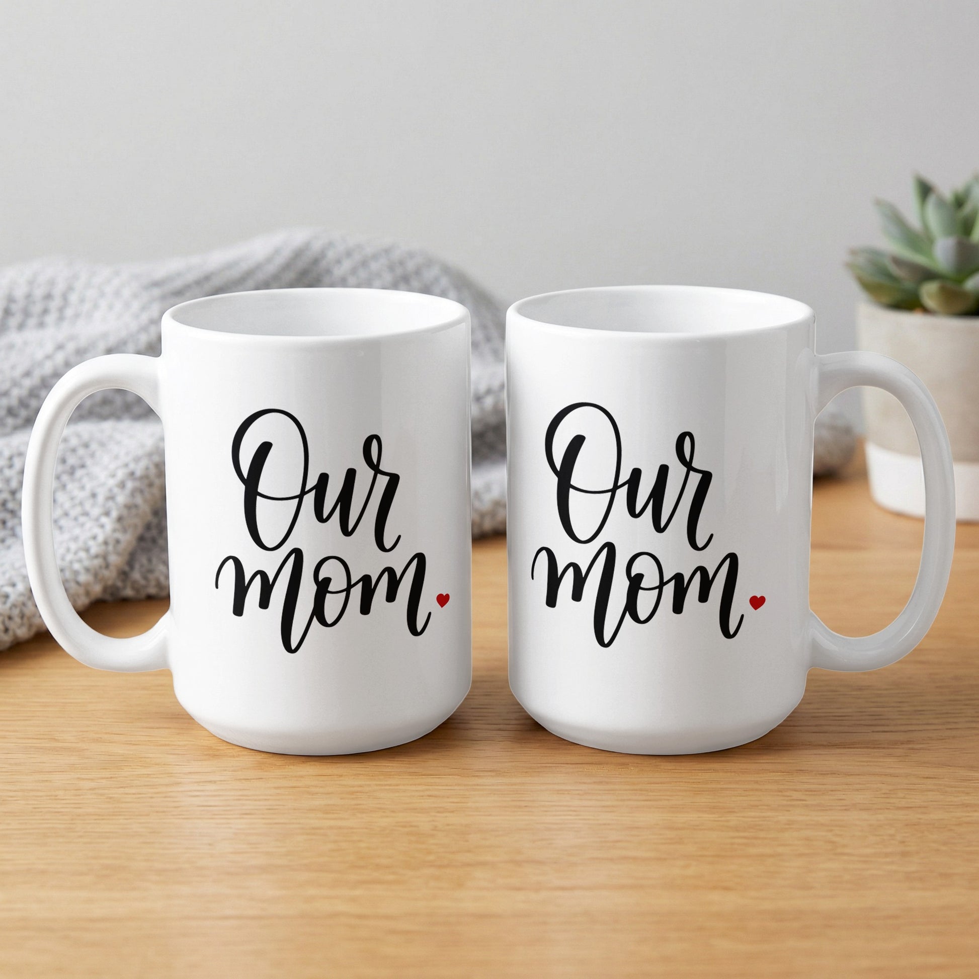 Two Our Mum Heart 15oz mugs showing full scripted design with red heart accent and glossy ceramic finish for gifting.