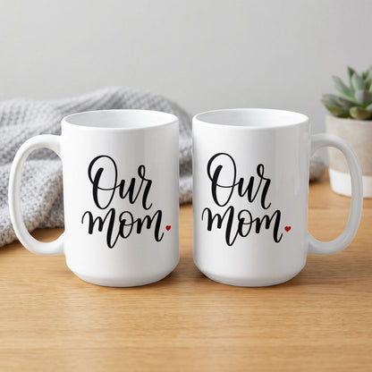 Two Our Mum Heart 15oz mugs showing full scripted design with red heart accent and glossy ceramic finish for gifting.