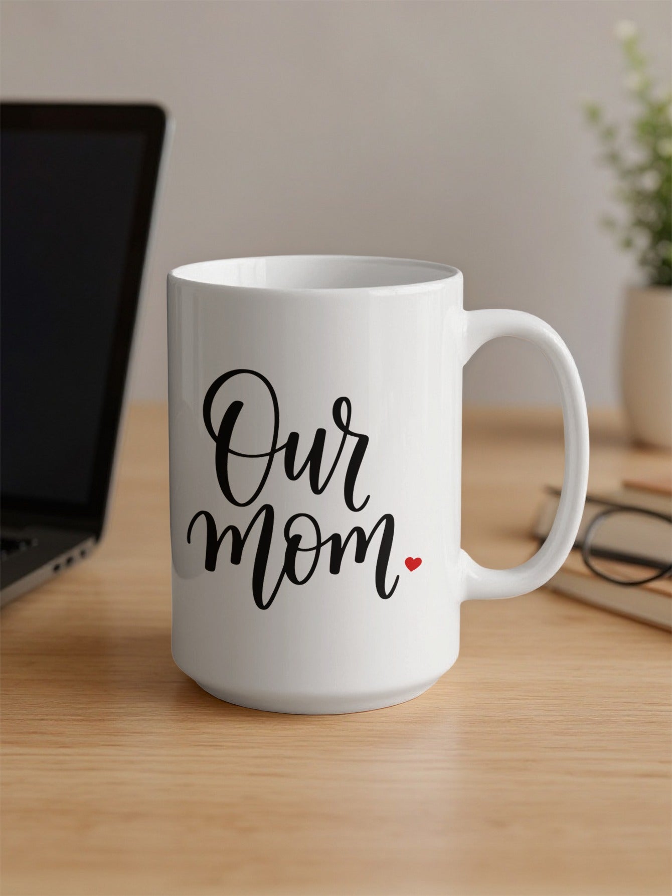 Our Mum Heart 15oz mug on office desk, bringing warmth and sentimental style to everyday coffee breaks at work.