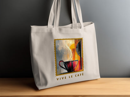 Painterly Steam Tote Bag on timber sideboard with charcoal-red cup, cream steam and VIVE LE CAFE subtitle.