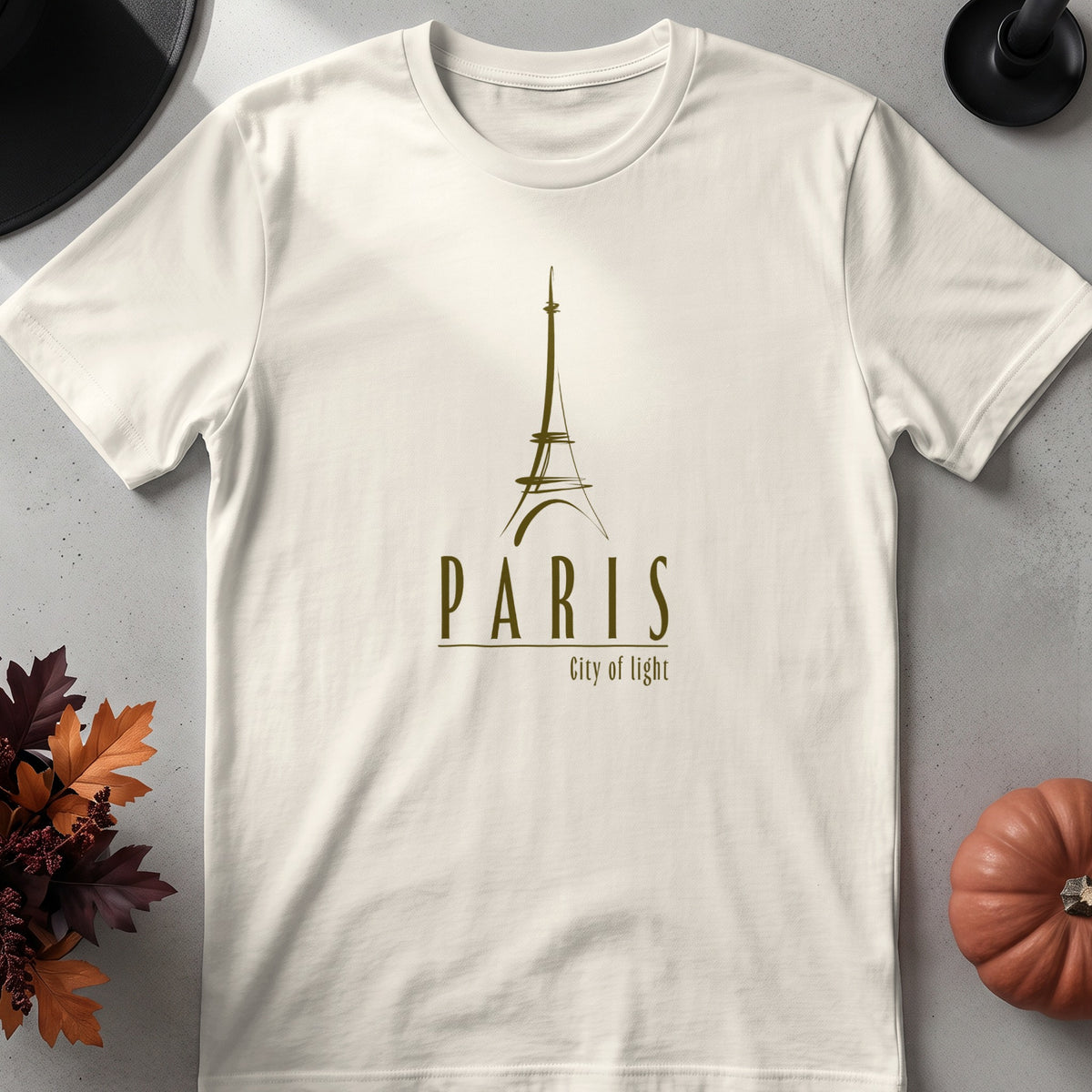 White Paris City of Light T-Shirt showing the slender olive Eiffel Tower graphic, widely spaced PARIS lettering and City of Light subtitle.