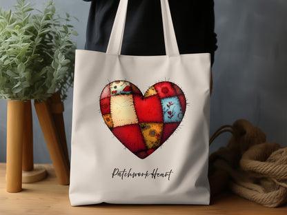 Natural-tone Patchwork Heart Tote Bag featuring red, cream, golden-yellow and blue panels, a leafy sprig, flower motif and black stitch-style outlines.