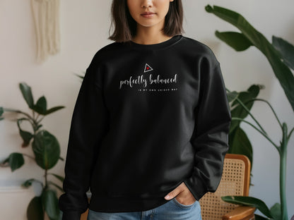 Black cotton-blend sweatshirt with empowering perfectly balanced in my own unique way design, long sleeves, and cozy fit.