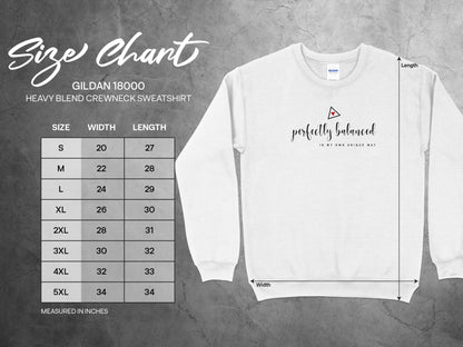 Detailed size chart for perfectly balanced sweatshirt showing chest, sleeve, and length measurements for unisex fit.