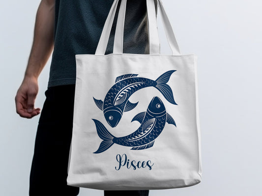 Cotton tote with circular Pisces composition and intricate navy ocean-inspired line illustration.