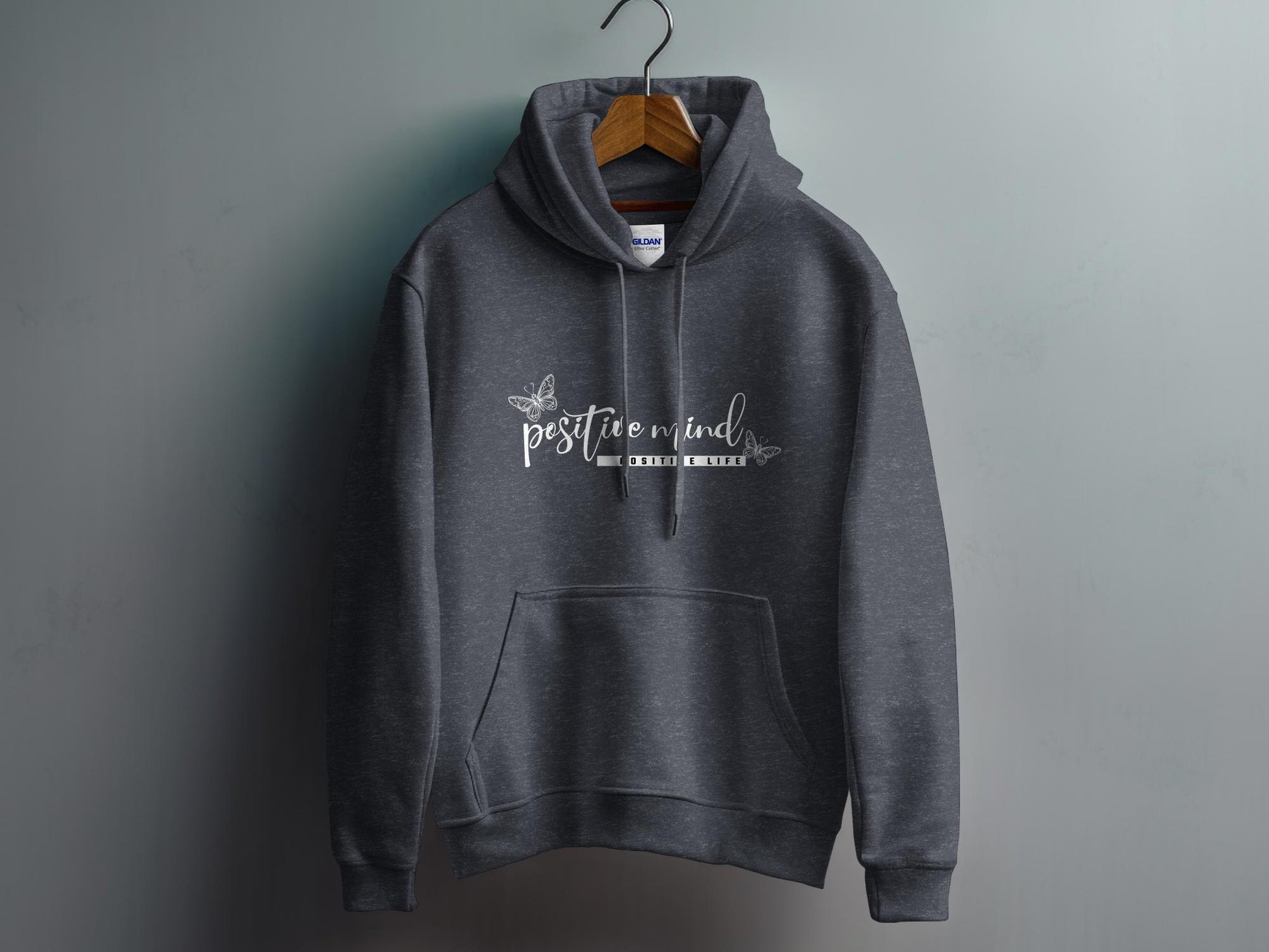 Dark Heather Grey Positive Mind Positive Life Hoodie showcasing bold Positive Life text with script lettering above.