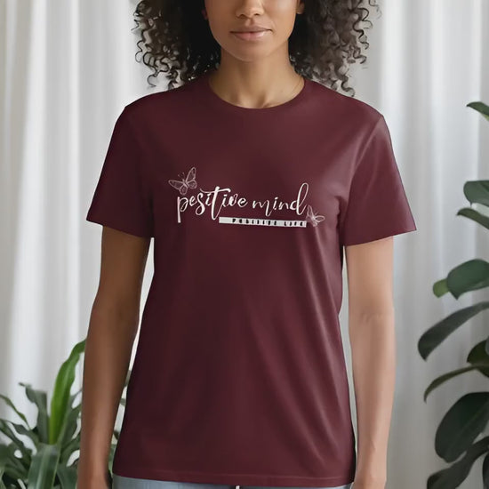 Video of positive mind positive life short sleeve crew neck t-shirt.