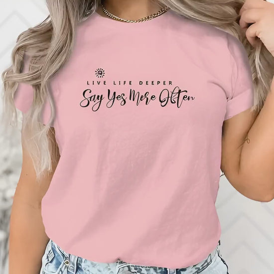 Video of live by the sun play by the moon short sleeve crew neck t-shirt.