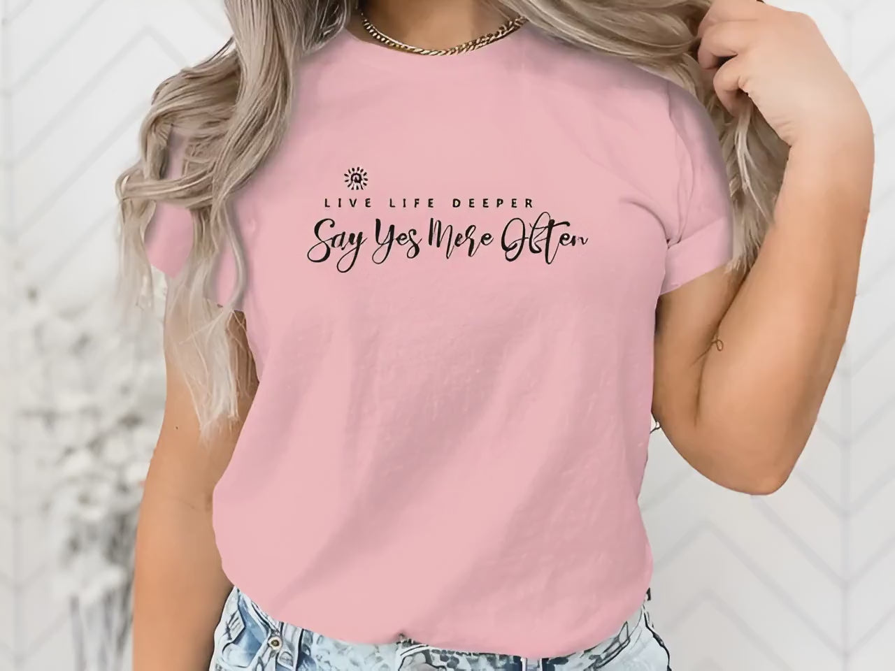 Video of live by the sun play by the moon short sleeve crew neck t-shirt.