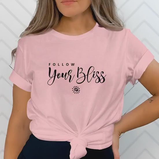 Video showing Follow Your Bliss crew neck tee for stylish and affordable everyday fashion.