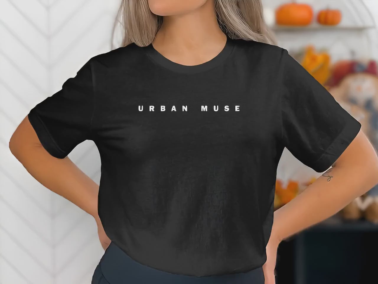 Video of short sleeve crew neck Urban Muse statement tee, offering unisex cut and soft cotton.