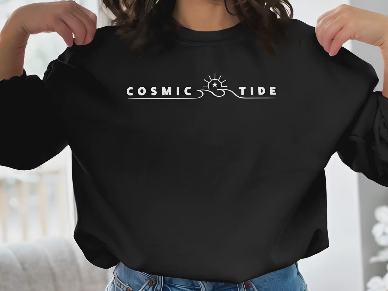 Cosmic Tide graphic sweatshirt shown on model with subtle fabric movement