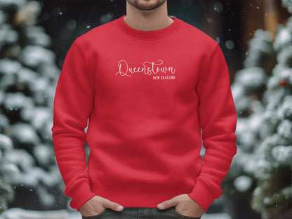 Red Queenstown New Zealand Sweatshirt with crew neck, cotton blend fabric, seamless body, & relaxed unisex fit
